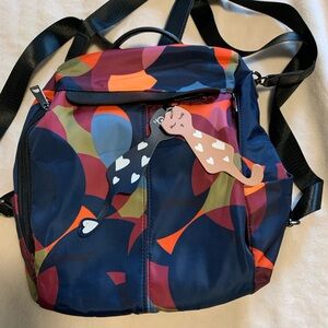 Lightweight backpack/purse. This pretty bag is a backpack or shoulder bag.